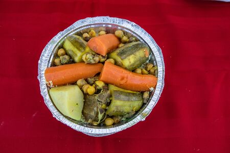 Fresh food at outdoor farmer's market. Vegetarian street food is seen close up and from above,...