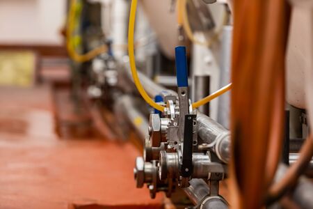 stainless steel metallic pipes and fittings selective focus, Centric Semi Lug wafer type butterfly valve, copy spaceの写真素材