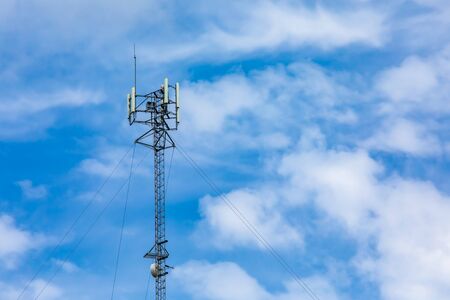 A low angle view of a cable stayed cellular base station, used in the triangulation for geolocation...
