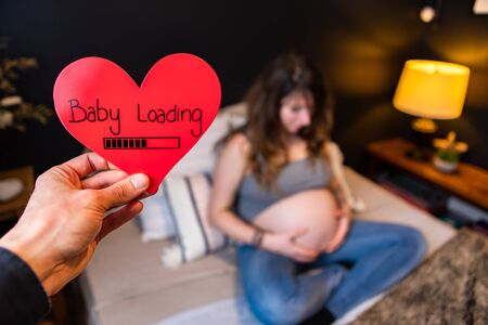 A selective focus conceptual shot as future parents look forward to having a valentine child....