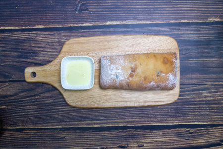 Chiabatta on the serving board, top view, top view.の写真素材