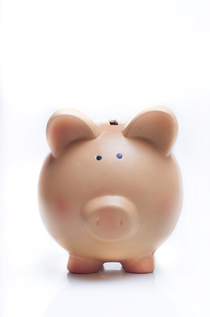 piggy bank isolated on whiteの写真素材