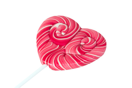 Lollipop in the form of heart isolated on white backgroundの写真素材