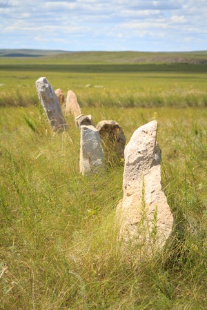 The Large stones standing on the green plainの写真素材