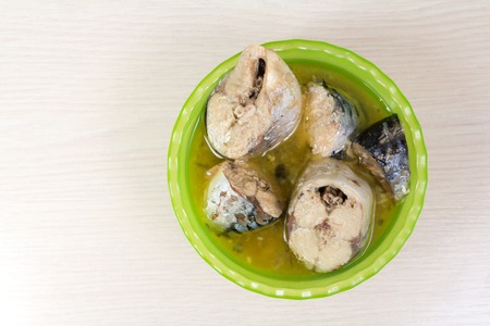 Mackerel in oil in the green plateの写真素材