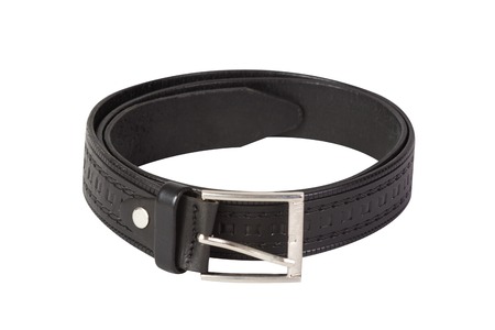 Black leather belt isolated on white backgroundの写真素材