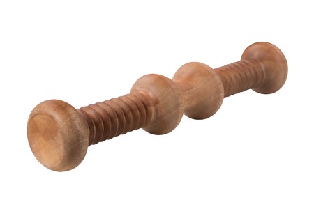 Wooden Massager for feet and back isolated on white backgroundの写真素材