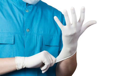 unknown male surgeon doctor clothing white glove on the hand isolated on whiteの写真素材