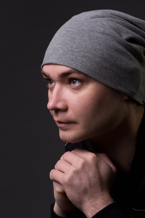 Portrait of a young hipster guy,studio pictureの写真素材