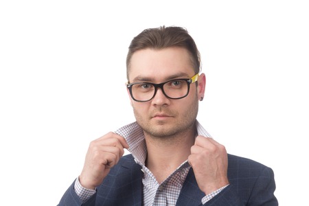 Portrait of a young successful businessman isolated on whiteの写真素材
