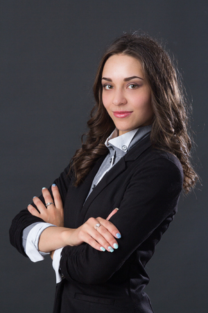 portrait of a young beautiful smiling girl, studio pictureの写真素材