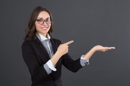 business women pointing an idea, studio pictureの写真素材