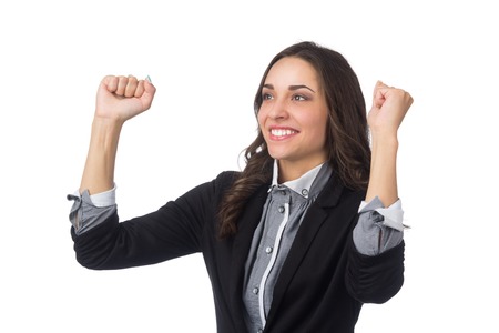 successful business women with arms up isolated on whiteの写真素材