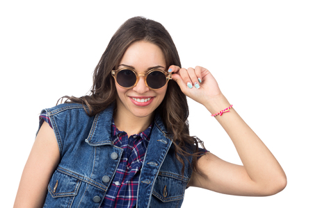 young beautiful girl with sunglasses isolated on whiteの写真素材