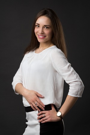 portrait of a young beautiful smiling girl, studio pictureの写真素材