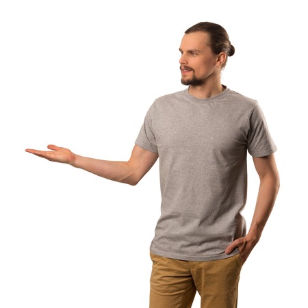 Bearded attractive caucasian guy presenting and promoting isolated on white backgroundの写真素材