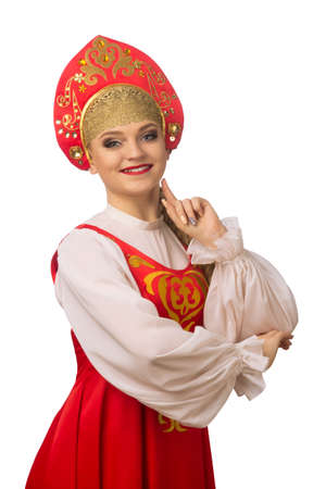 Beautiful smiling caucasian girl in russian folk costume isolated on white backgroundの写真素材