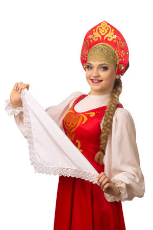 Beautiful smiling caucasian girl in russian folk costume isolated on white backgroundの写真素材