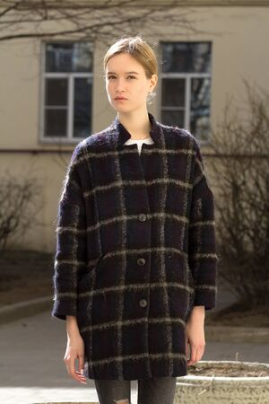 Portrait of a attractive caucasian blonde girl outdoorsの写真素材