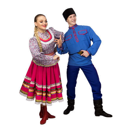 Beautiful caucasian cuple dancing in Russian folk costumes isolated on white background. Full length.の写真素材
