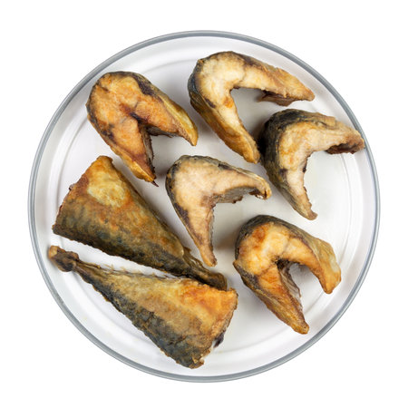 Pieces of fried mackerel fish isolated on white background. Top view.の写真素材