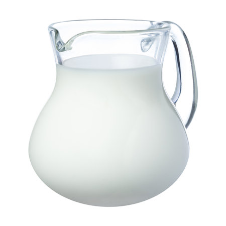 Fresh milk in a glass jug isolated on white backgroundの写真素材
