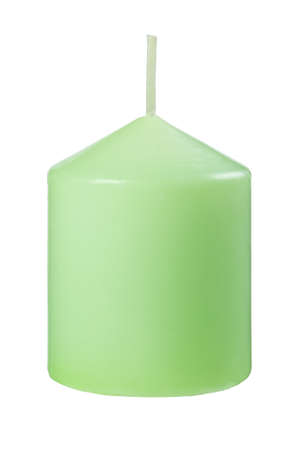 New green candle isolated on white backgroundの写真素材