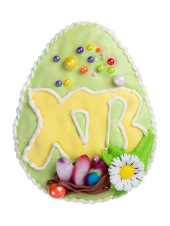 Easter cookies in the form of an egg isolated on white backgroundの写真素材