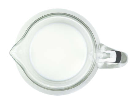 Jug of milk isolated on white background. View from above.の写真素材