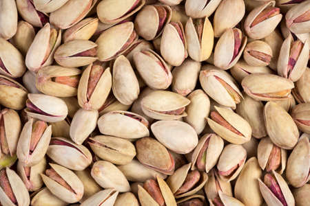 Salted pistachios as a backgroundの写真素材
