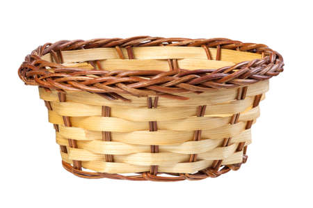 Empty wicker basket isolated on white backgroundの写真素材