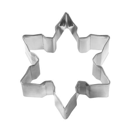 Baking dish for Christmas cookies in the shape of snowflake isolated on white backgroundの写真素材