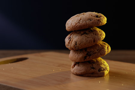 Bakery sweets isolated on light wooden board, late afternoon side lightの写真素材