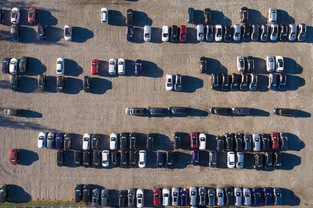 Aerial view of a parking lot with many cars in rows. Russia, 2106の写真素材