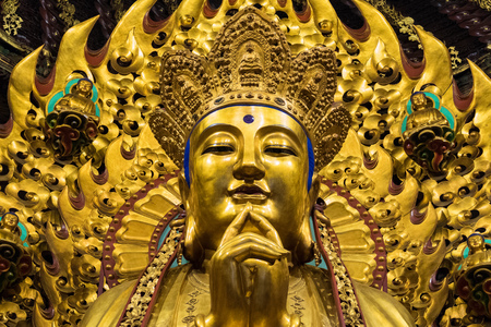 close-up of Buddhist God statue in the ancient longhua temple. China, Shanghaiの写真素材