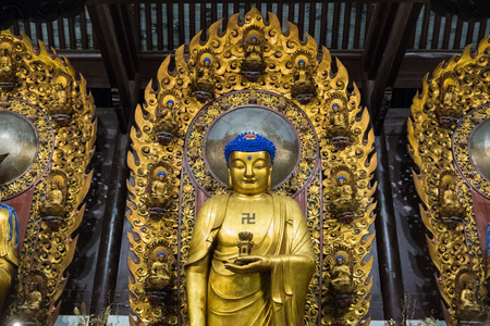 close-up of Buddhist God statue in the ancient longhua temple. China, Shanghaiの写真素材