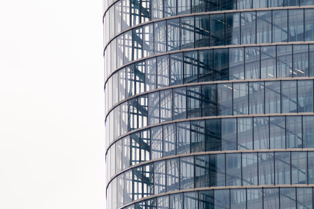 details of the facade of a modern skyscraper made of glass and steel closeup. Shanghai World Financial Centerの写真素材