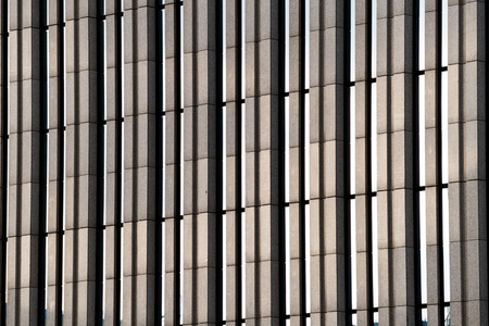details of the facade of a modern skyscraper made of glass and steel closeup. Shanghai World Financial Centerの写真素材