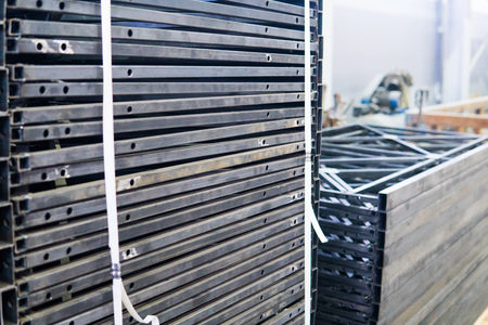 stacks of metal fences are at the Metalworking plant