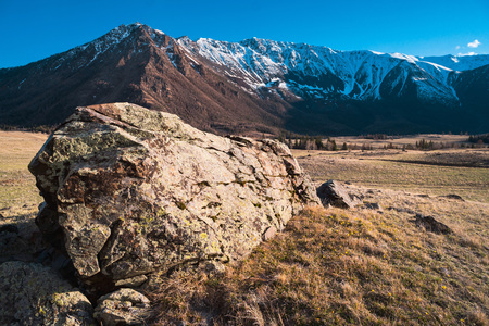 hill textured stones on the background of the Altai mountain valley. Altai mountains landscapeの写真素材