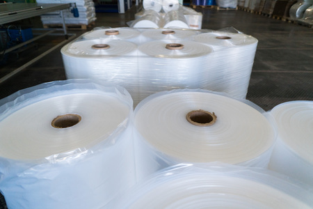 rolls of polyethylene or polypropylene film in a warehouseの写真素材