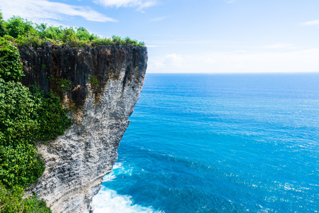 stone Islands and cliffs on the coast of the island, indonesia, baliの写真素材