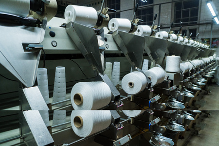 old knitted fabric. Textile factory in spinning production line and a rotating machinery and equipment production companyの写真素材