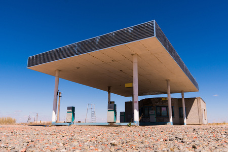 Old abandoned roadside truck stop fuel station near the small Texas town of Sierra Blancaの写真素材
