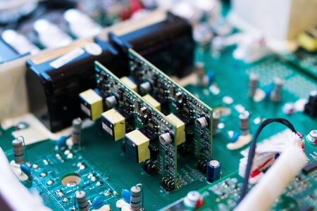 Resistors, capacitors and other electronic components of micro chip inside the computer close upの写真素材