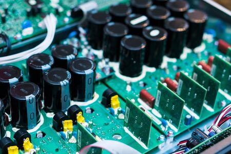 Resistors, capacitors and other electronic components of micro chip inside the computer close upの写真素材