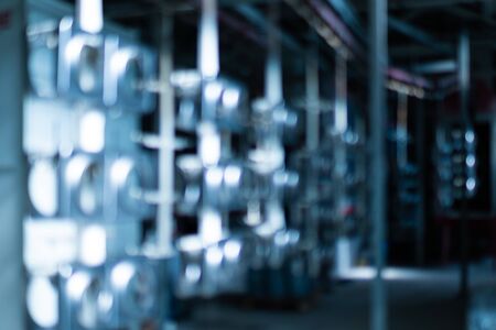 industrial abstract blurred background. Metal details on hooks before powder painting and surface preparationの写真素材