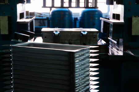 Steel sheets deposited in stacks in packs at the warehouse of metal products. Weathered metals sheet for construction. Metal corrosionの写真素材