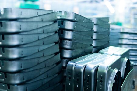 Steel sheets deposited in stacks in packs at the warehouse of metal products. Weathered metals sheet for construction. Metal corrosionの写真素材