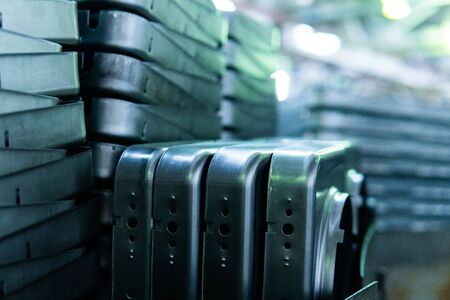 Steel sheets deposited in stacks in packs at the warehouse of metal products. Weathered metals sheet for construction. Metal corrosionの写真素材